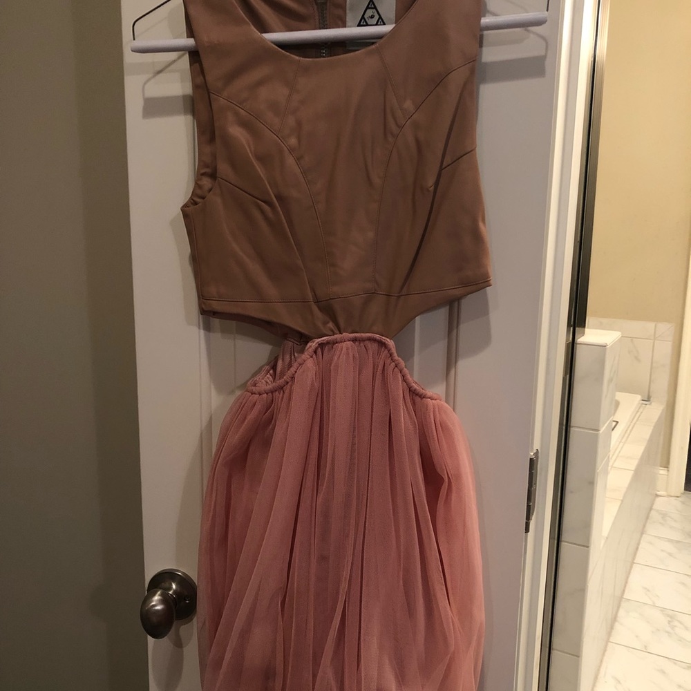 Unit leather dress with settle tutu like bottom
